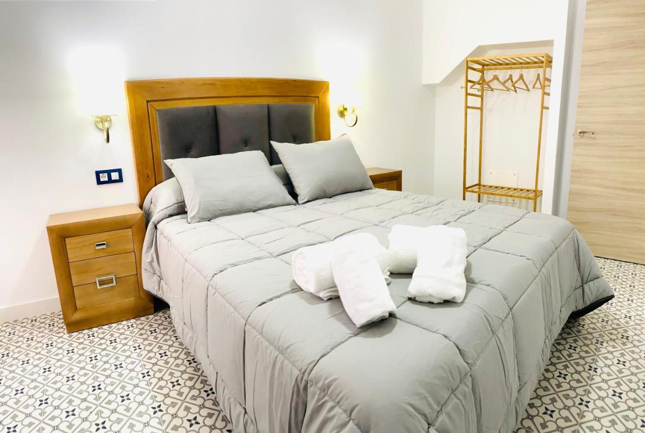 Al-Qazeres Suites Caces Exterior foto